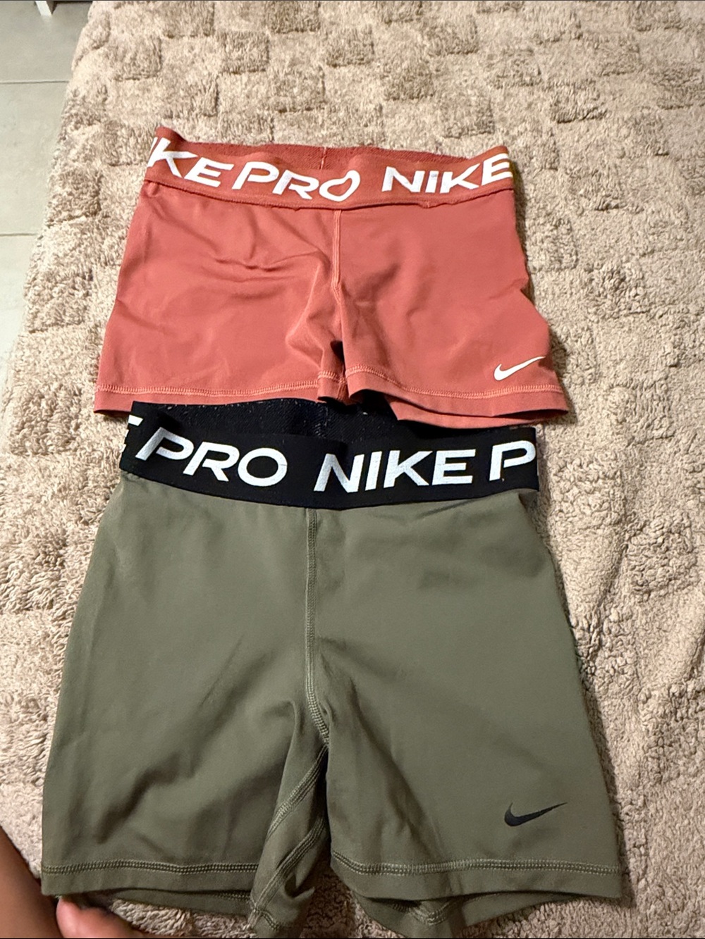 Nike Women’s Pro Athletic Shorts in Rust and Olive